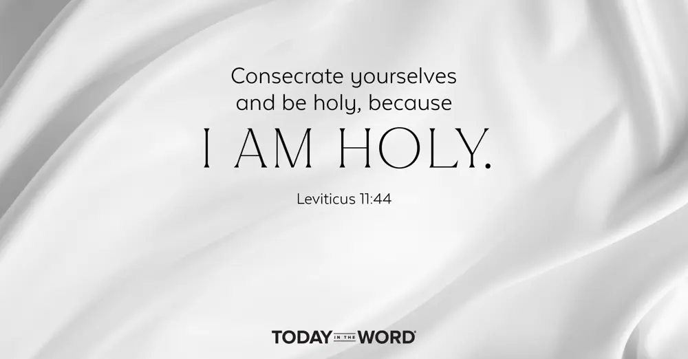 Today's daily devotional Bible verse: Leviticus 11:44 Consecrate yourselves and be holy, because I am holy. | White silk fabric